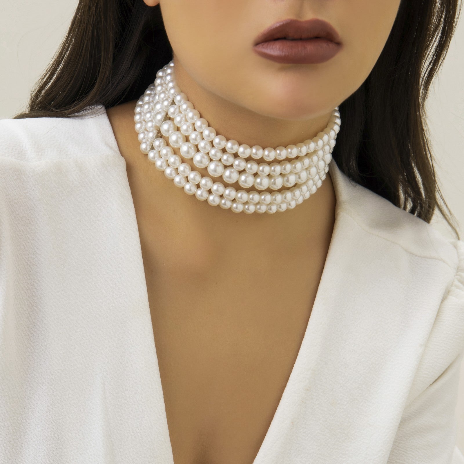Chain made of artificial beads, white